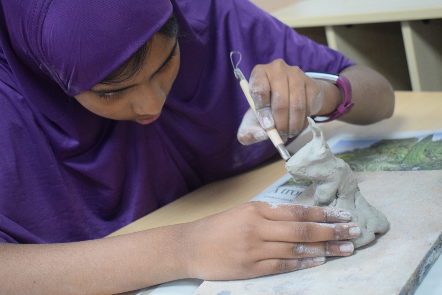 Year 6T Sculpting animals out of clay